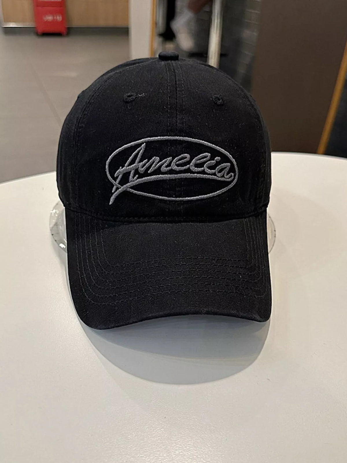 Detail of the cotton fabric and stitching on the cap