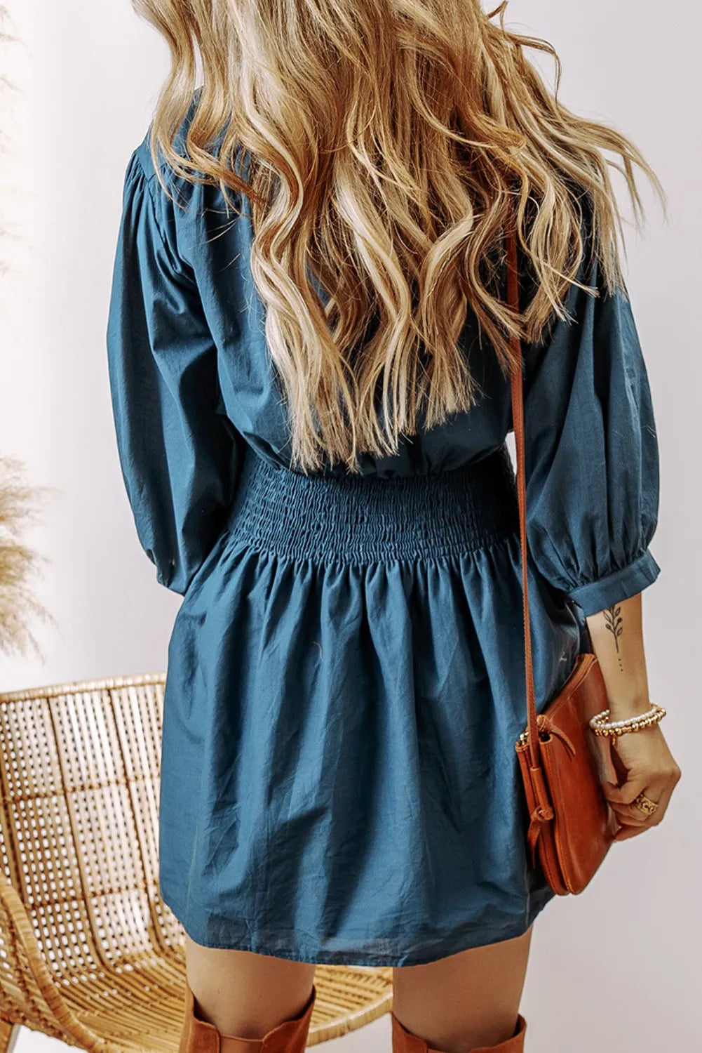 Smocked mini dress three quarter sleeve detail