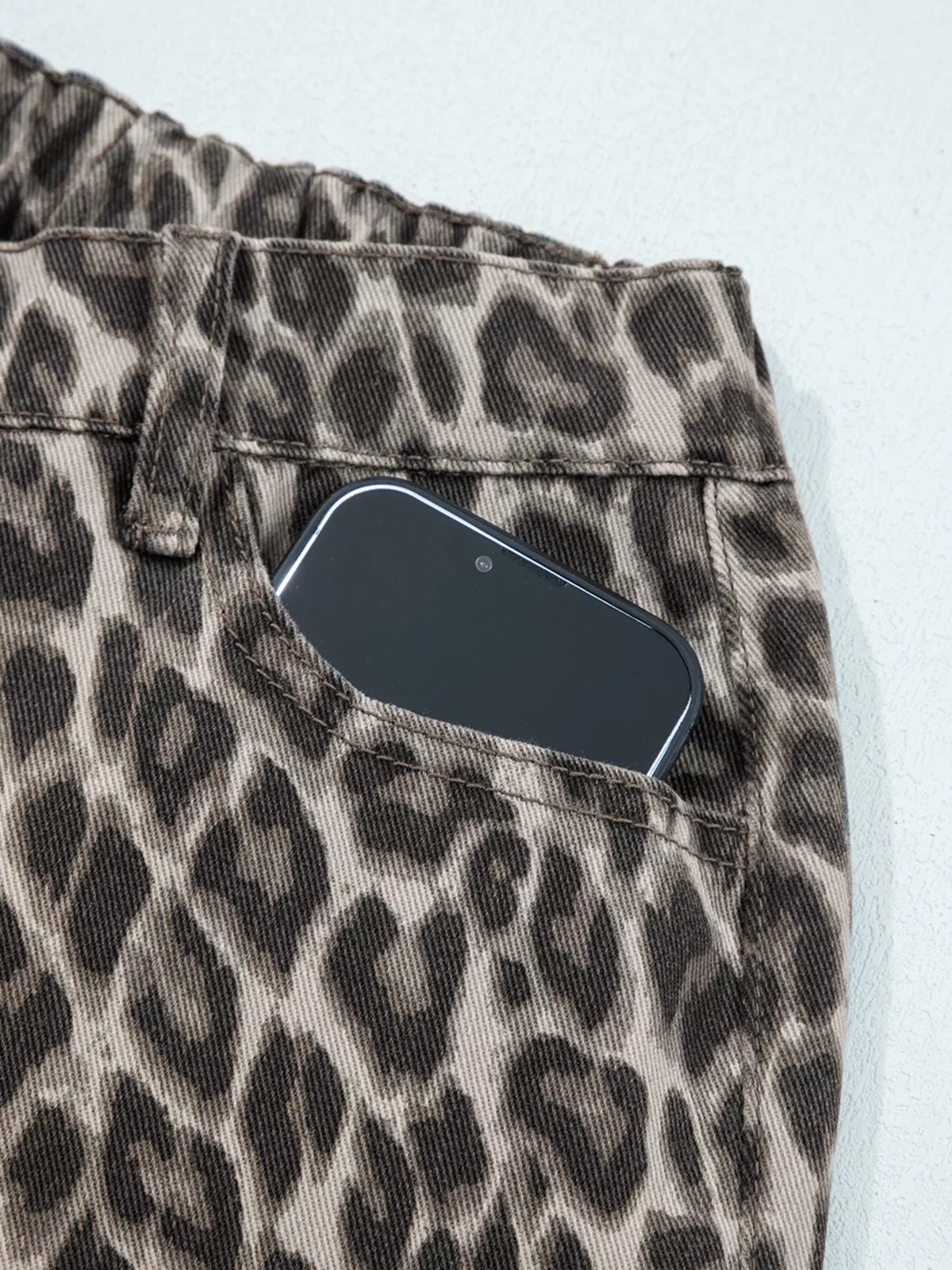 Animal print denim fabric close up