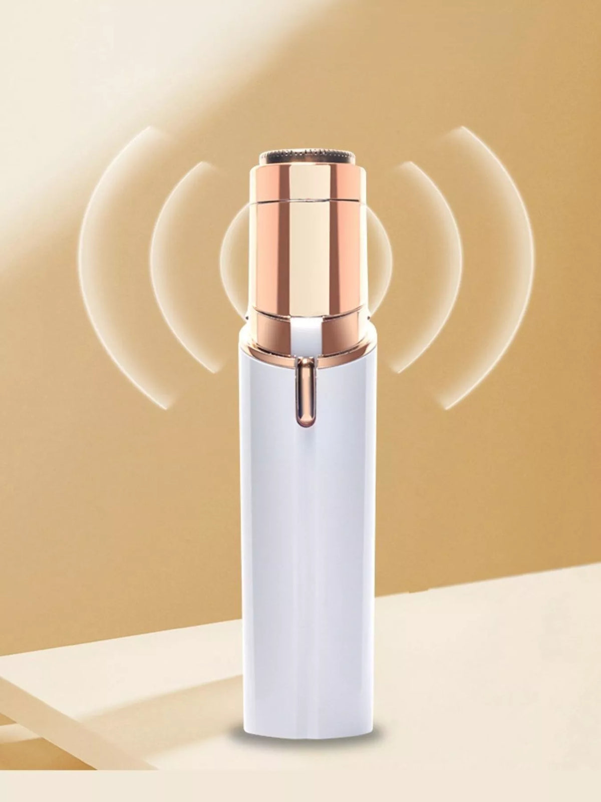 Painless hair remover held in hand