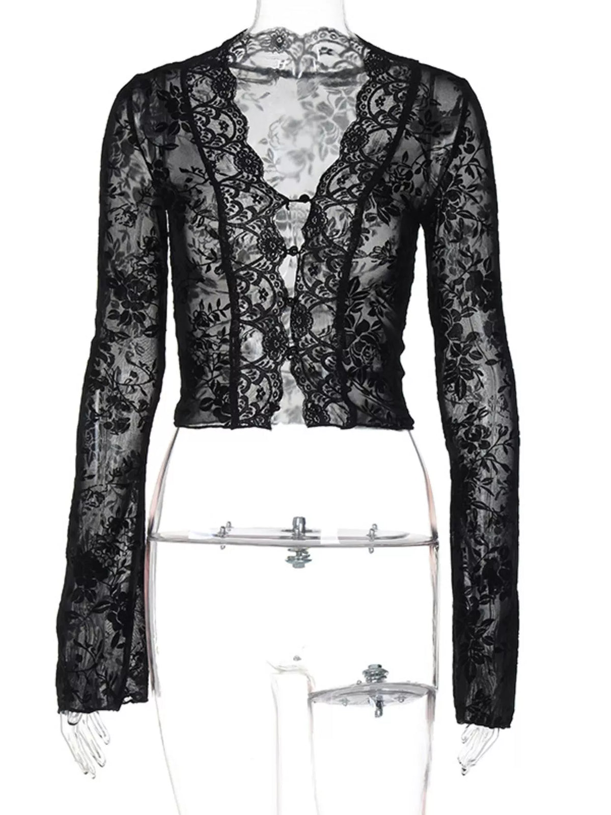 The black lace top styled with high waisted jeans