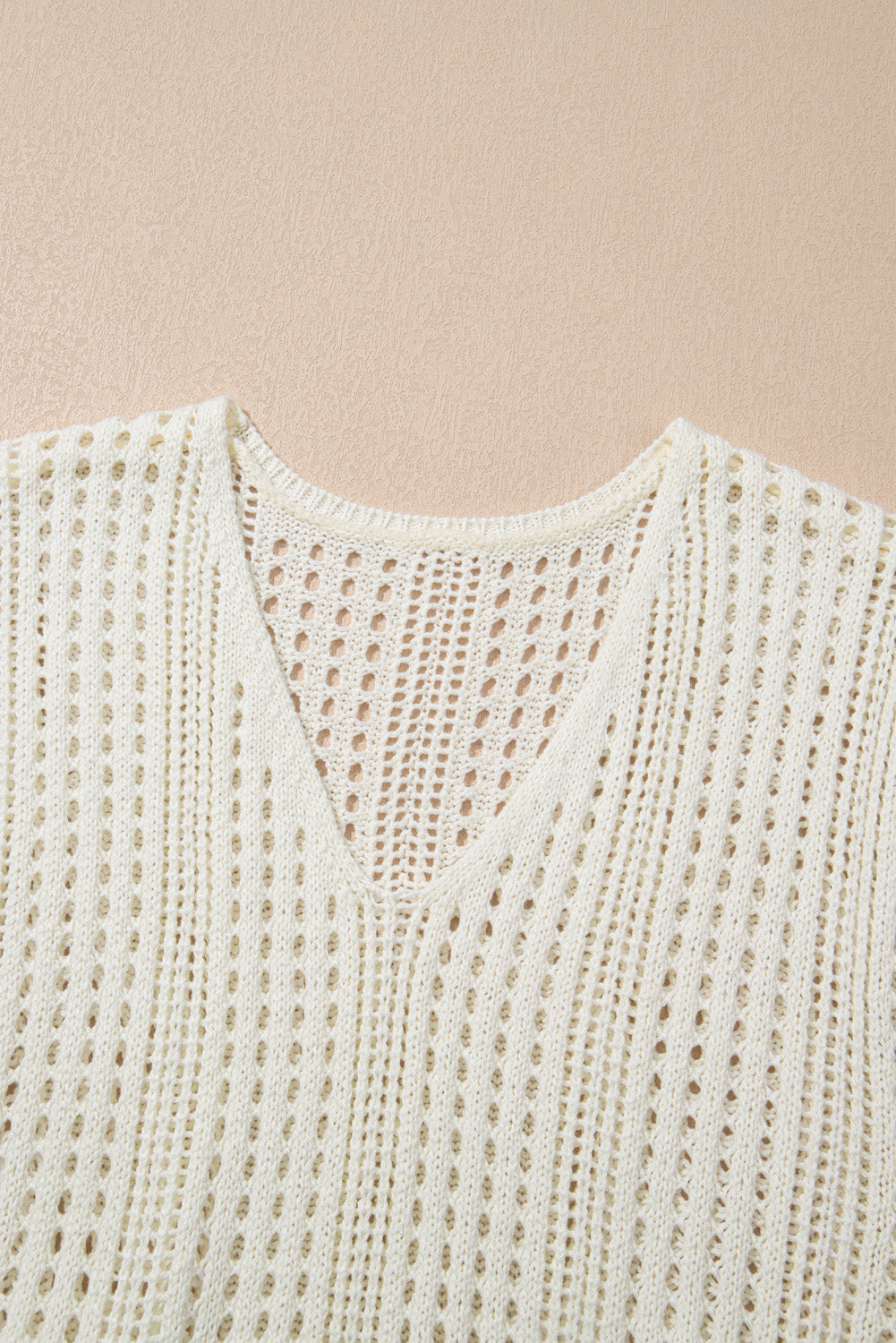 Open knit beach dress beige over swimwear
