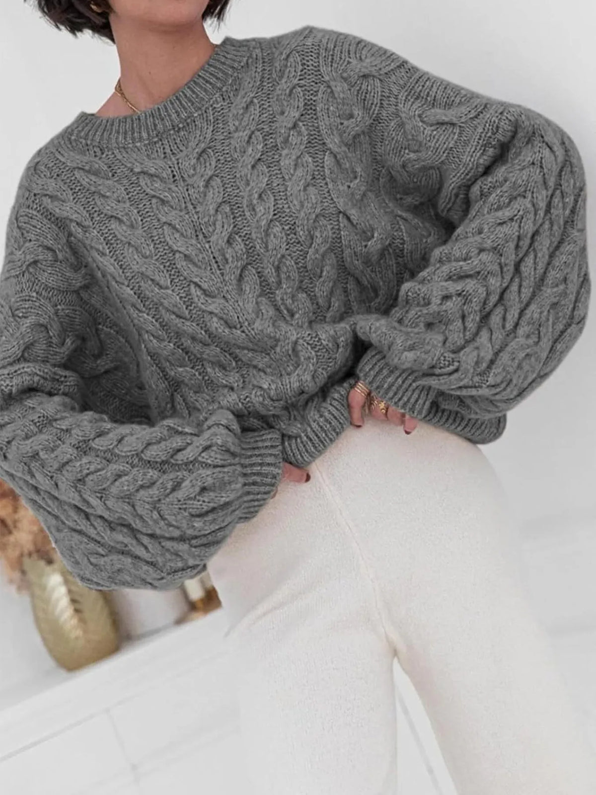 cable knit long sleeve sweater back view