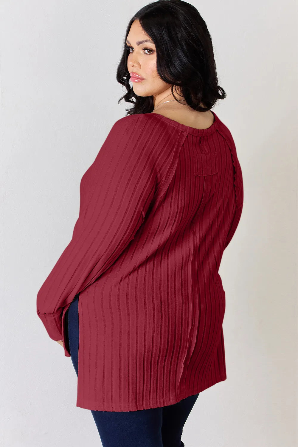 Ribbed tee side view showing hem slit