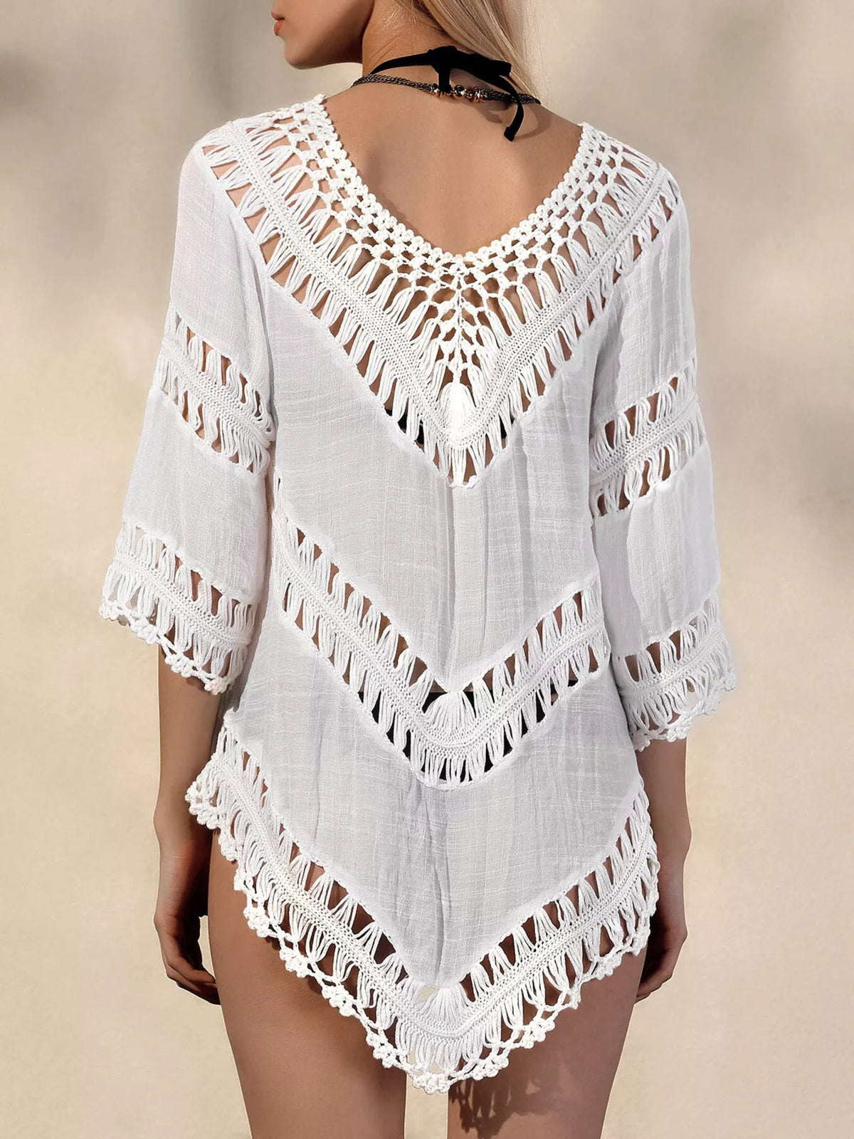 V neck crochet cover up worn over swimsuit