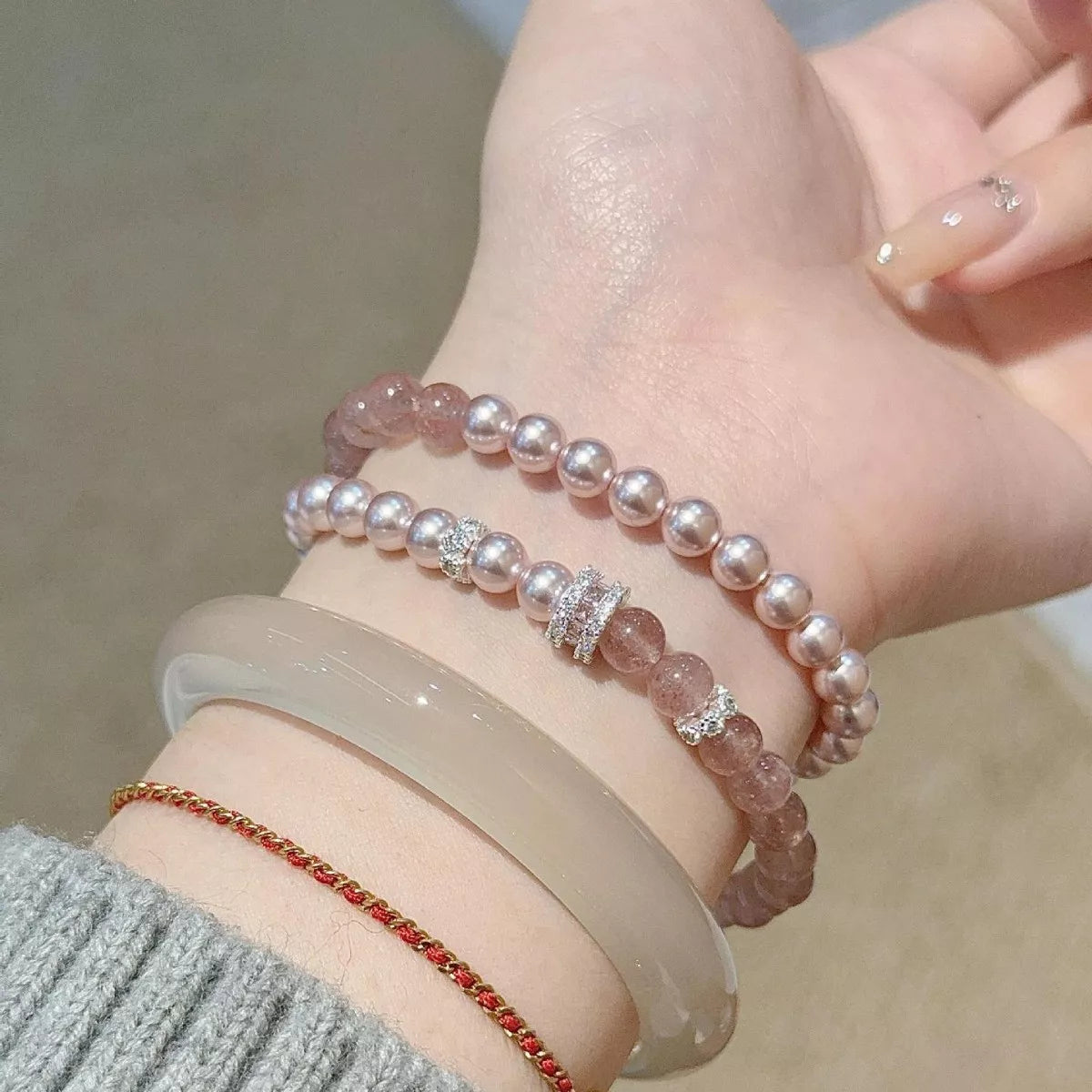 Pearl beaded bracelet set worn on wrist