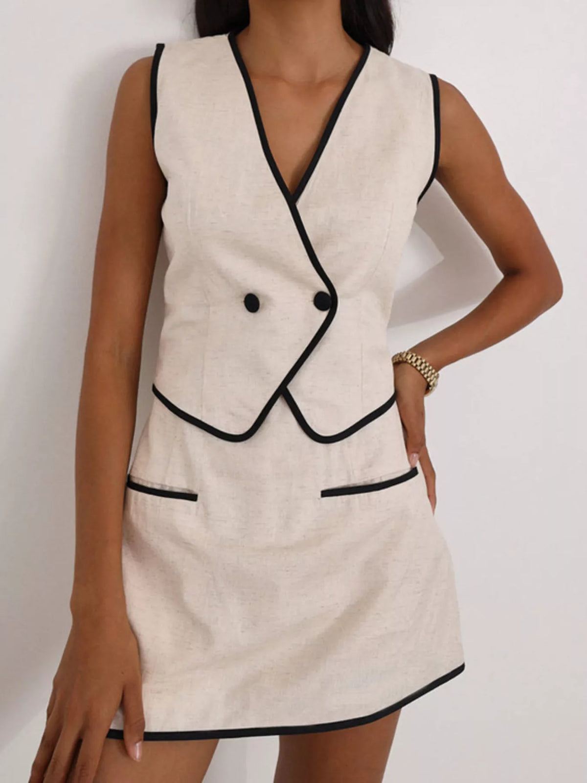 Beige coordinated vest and skirt set styled outfit