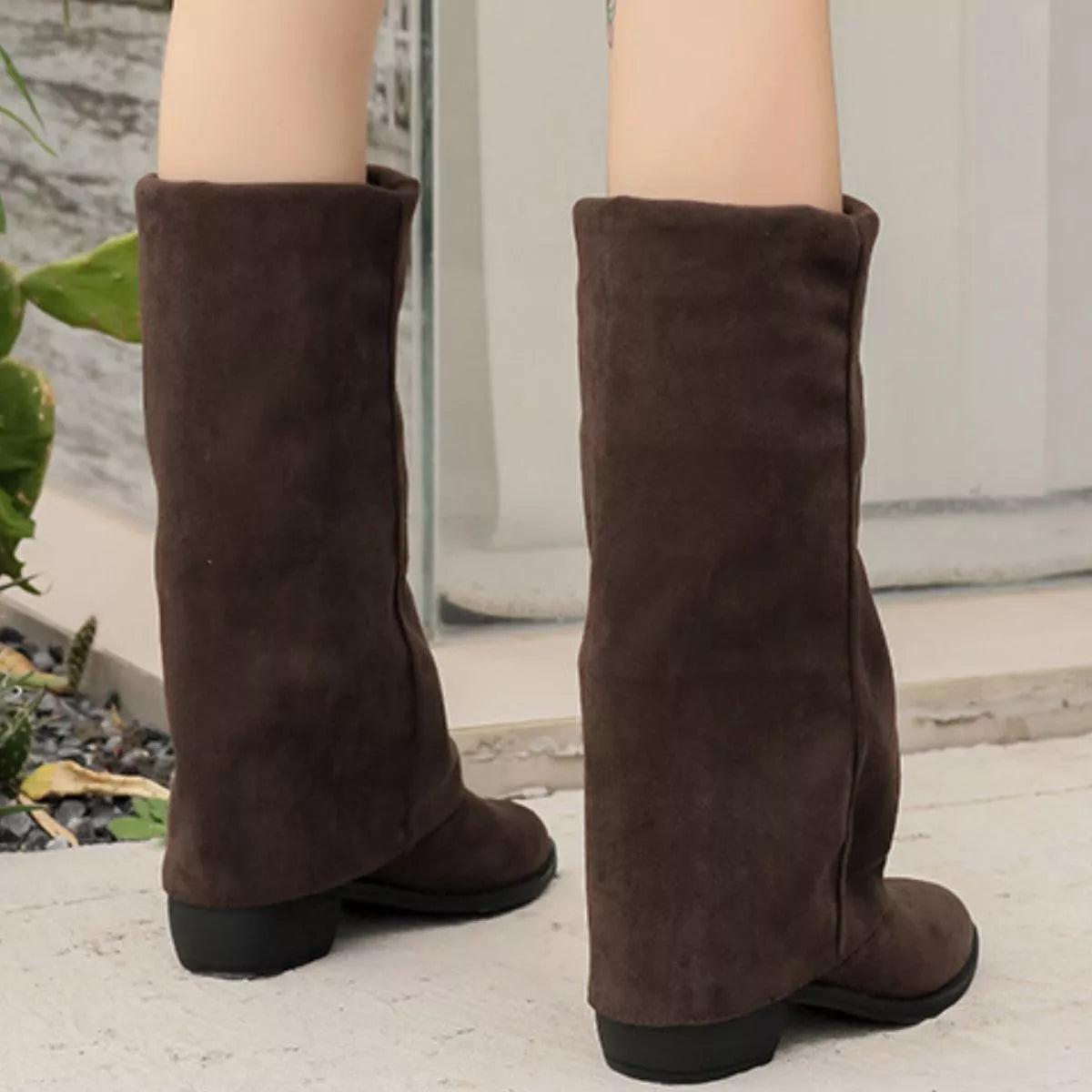 Point toe suede block heel boots styled with denim