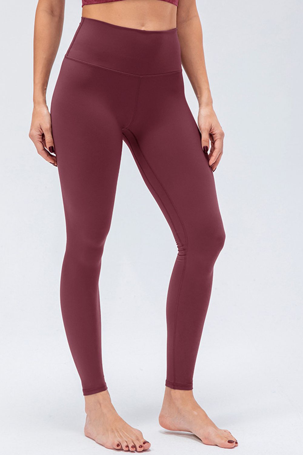 wide waistband slim fit active leggings worn with denim