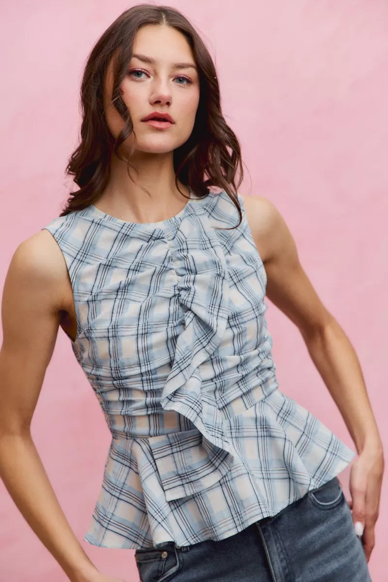 Blue plaid sleeveless ruffle peplum top front view