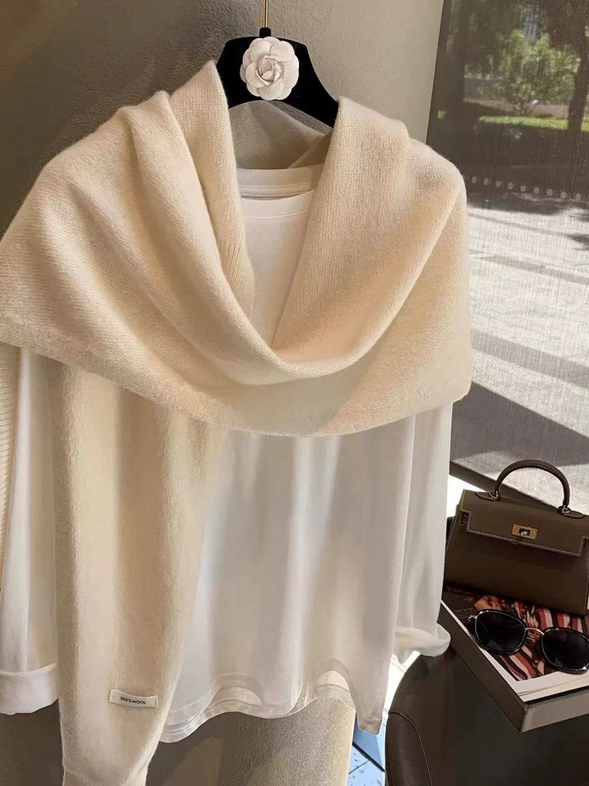 Wool knitted asymmetrical shawl knit texture detail