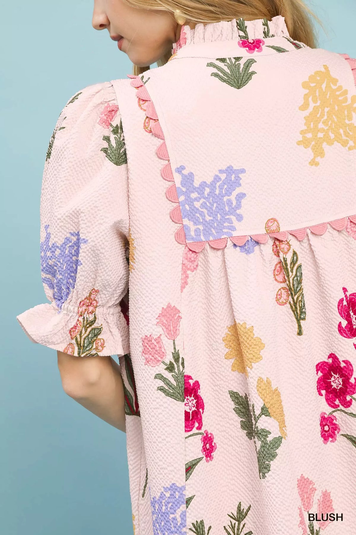 Full length styling shot of the Umgee floral dress