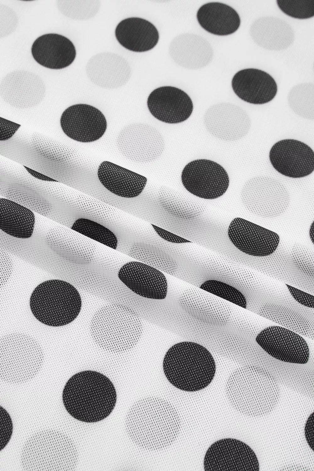 White polka dot sheer mesh long sleeve top back view