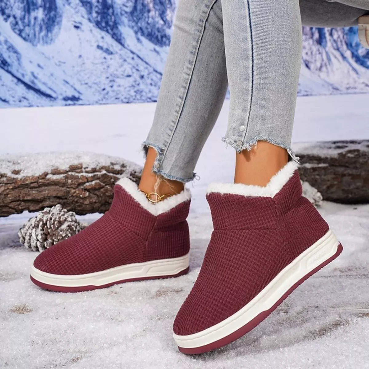 Cozy knit ankle boots, pair placed together