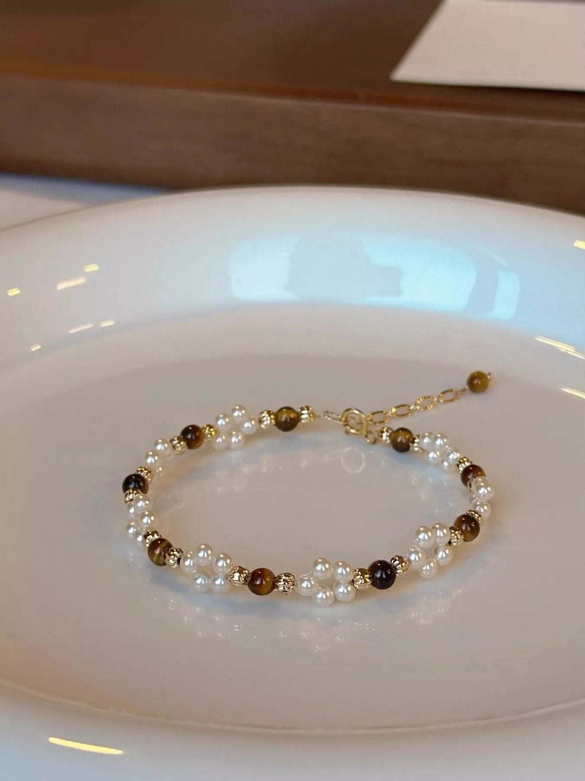 Pearl and tiger eye beaded bracelet styled