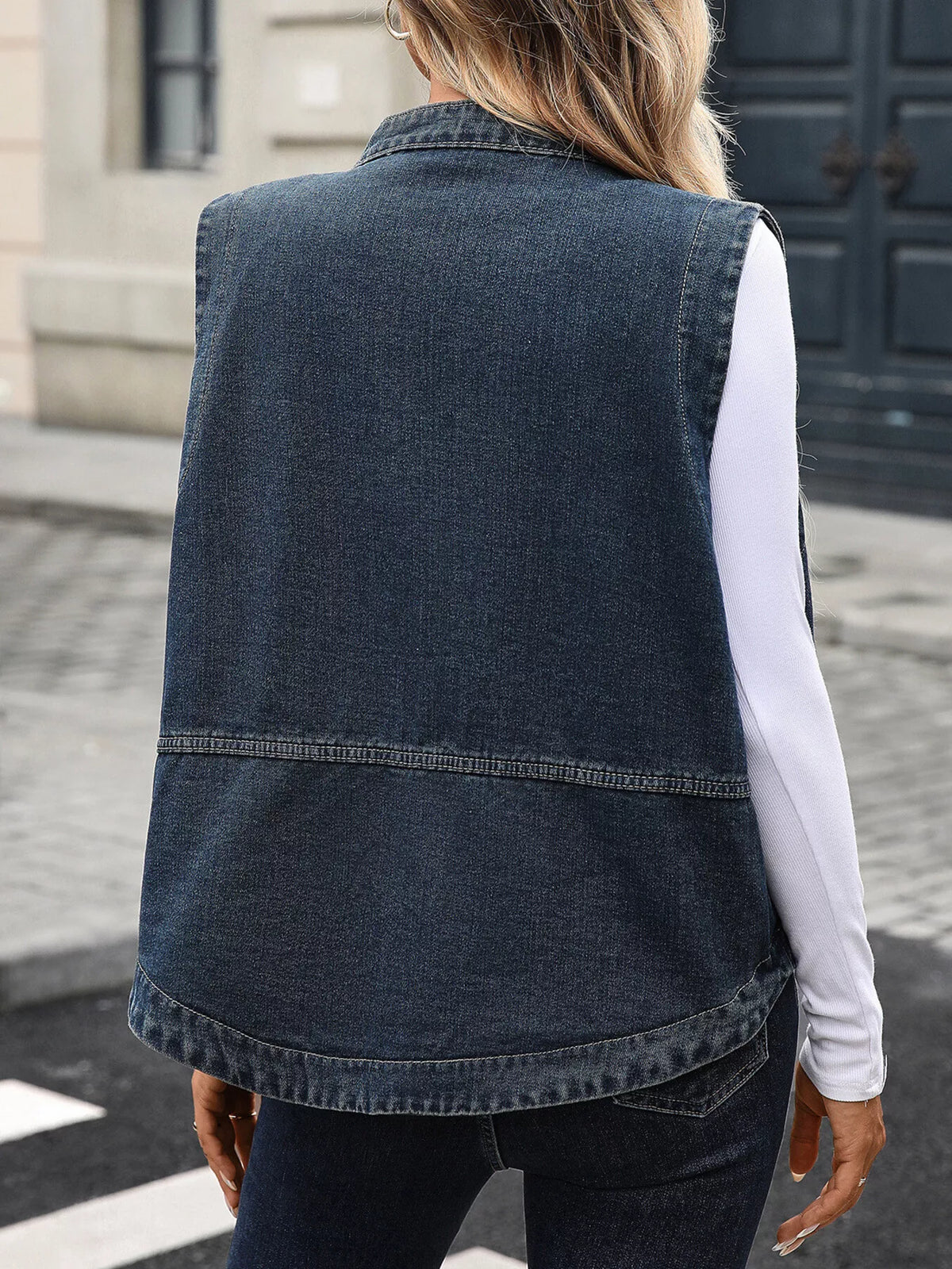 Snap Down Sleeveless Denim Vest in Black on model