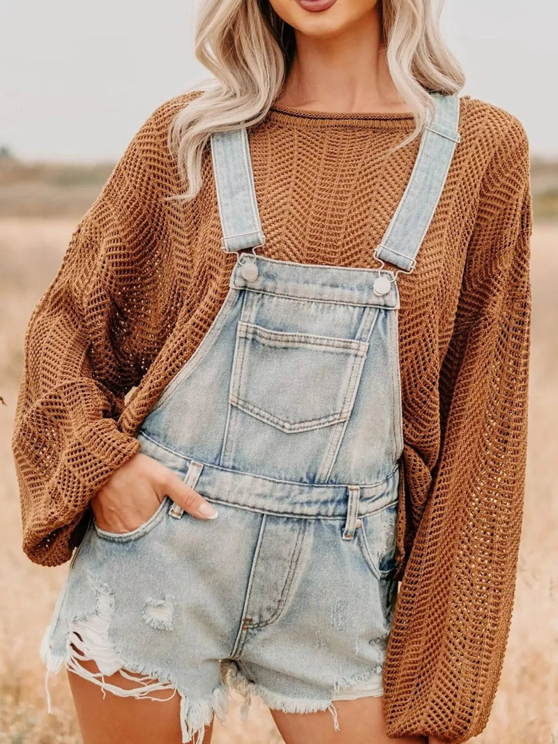 Distressed denim overall shorts front view