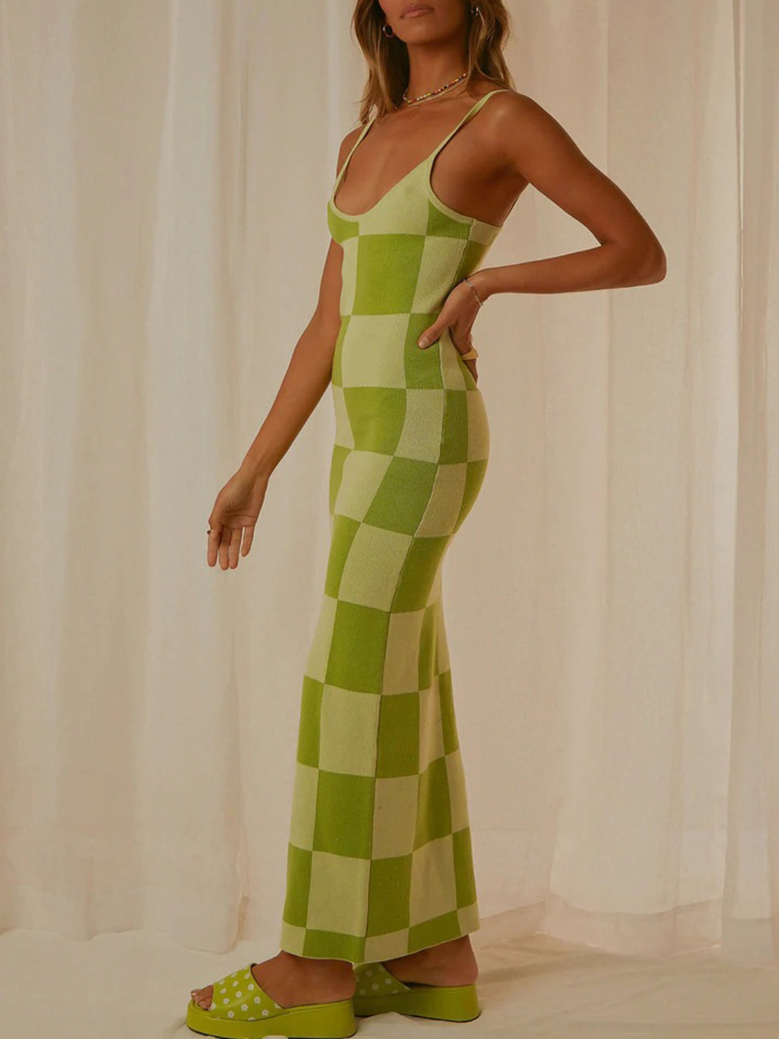 Spaghetti strap maxi sweater dress hem detail
