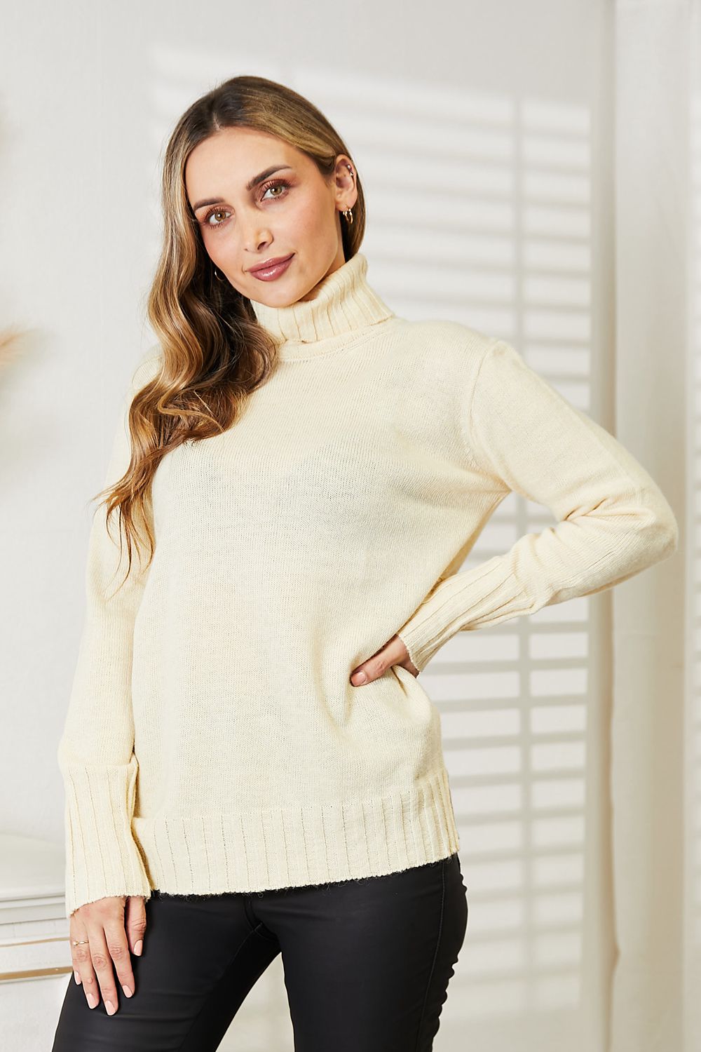 Turtleneck Side Slit Long Sleeve Sweater in Cream on model