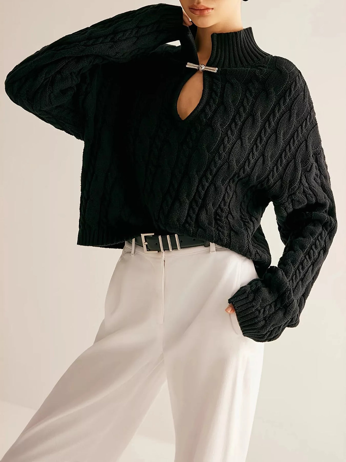 Keyhole cable knit sweater texture close up