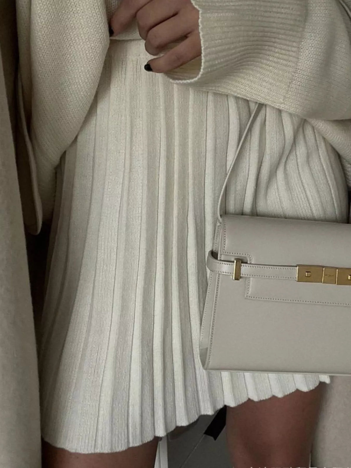 Ivory pleated sweater set styled look