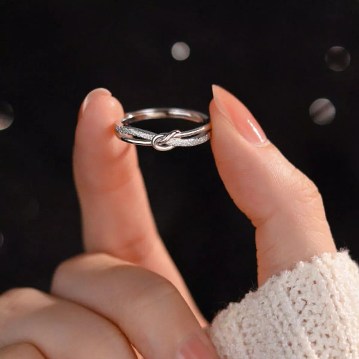 Sterling silver zircon knot ring fabric detail