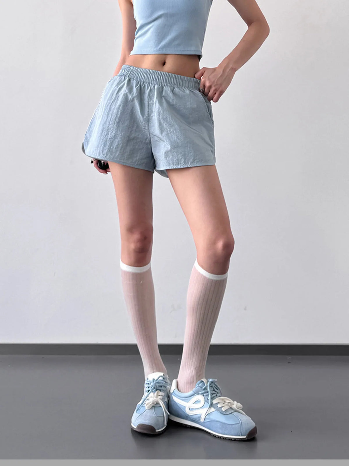 Quick dry elastic waist active shorts flat lay view