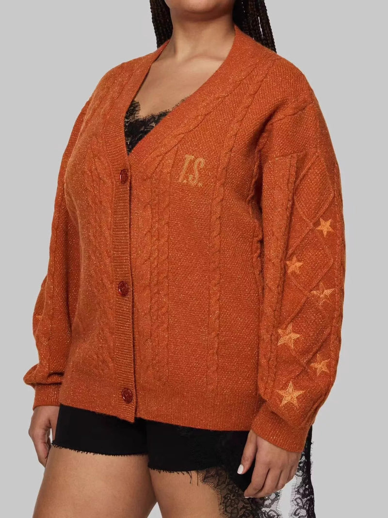 orange cable knit button up cardigan front view