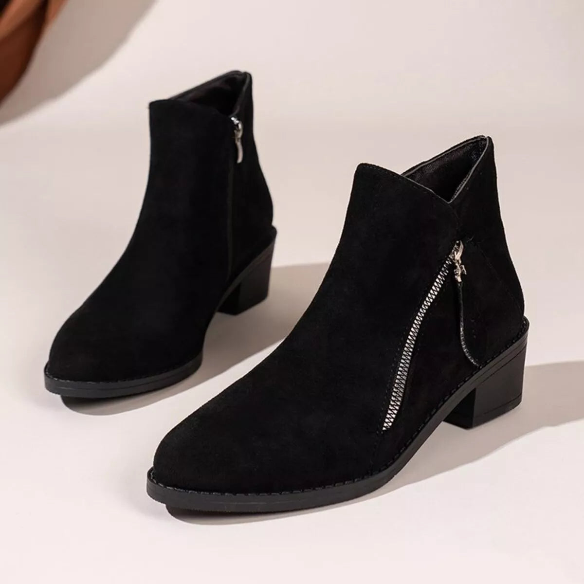 Black point toe block heels boots front facing view