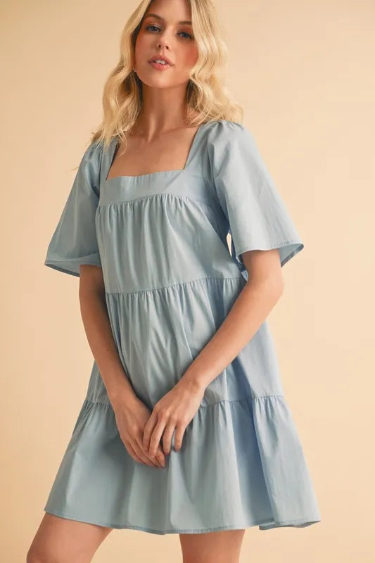 Light blue square neck half sleeve tiered dress front view