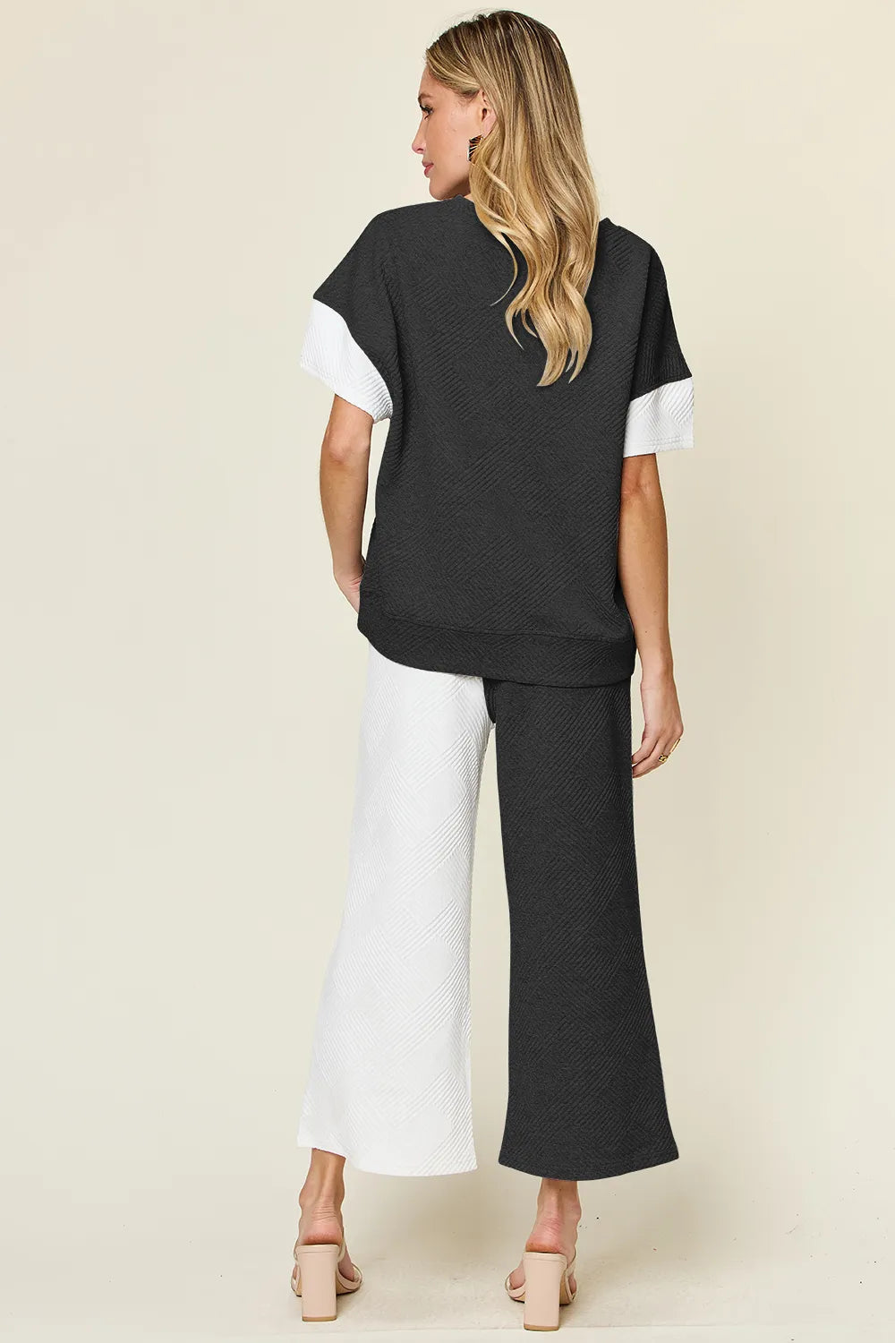 Side view of the two piece wide leg pants set
