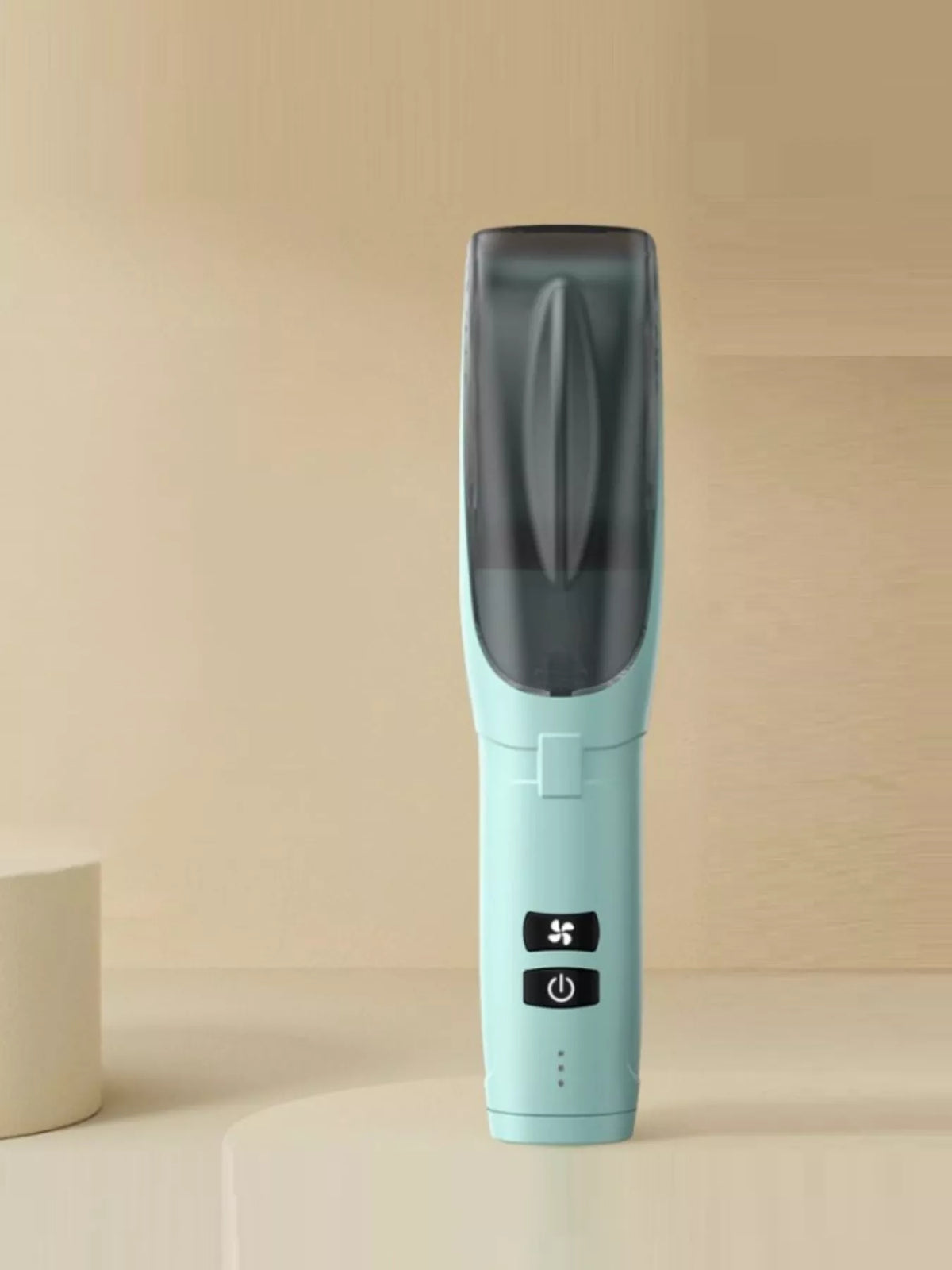 Hair clipper held in hand
