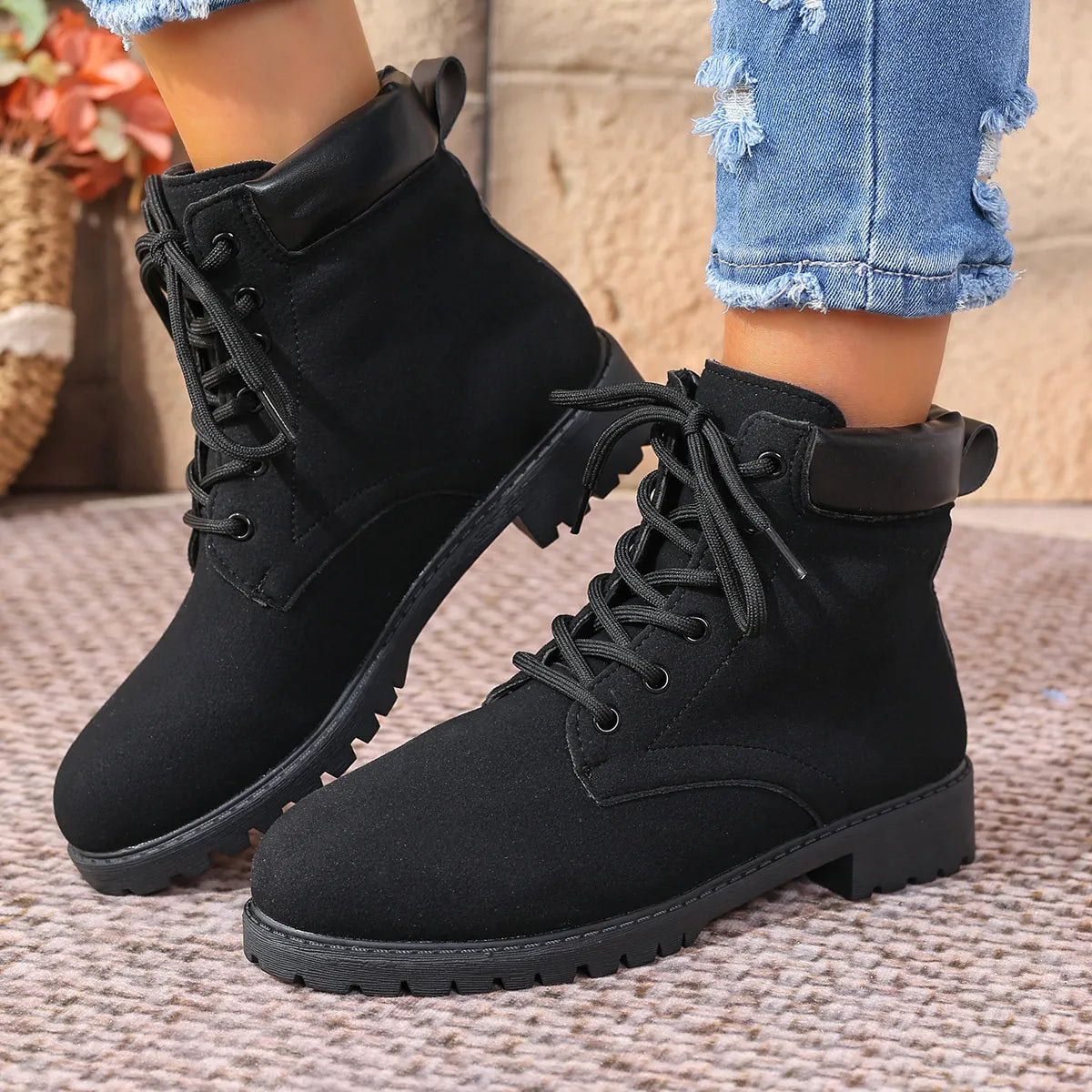 black lace up block heel boots upper close up