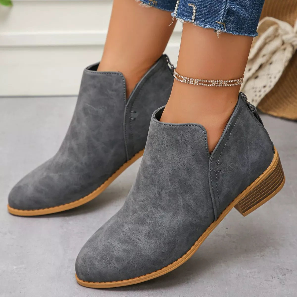 Point toe block heel ankle boots upper detail