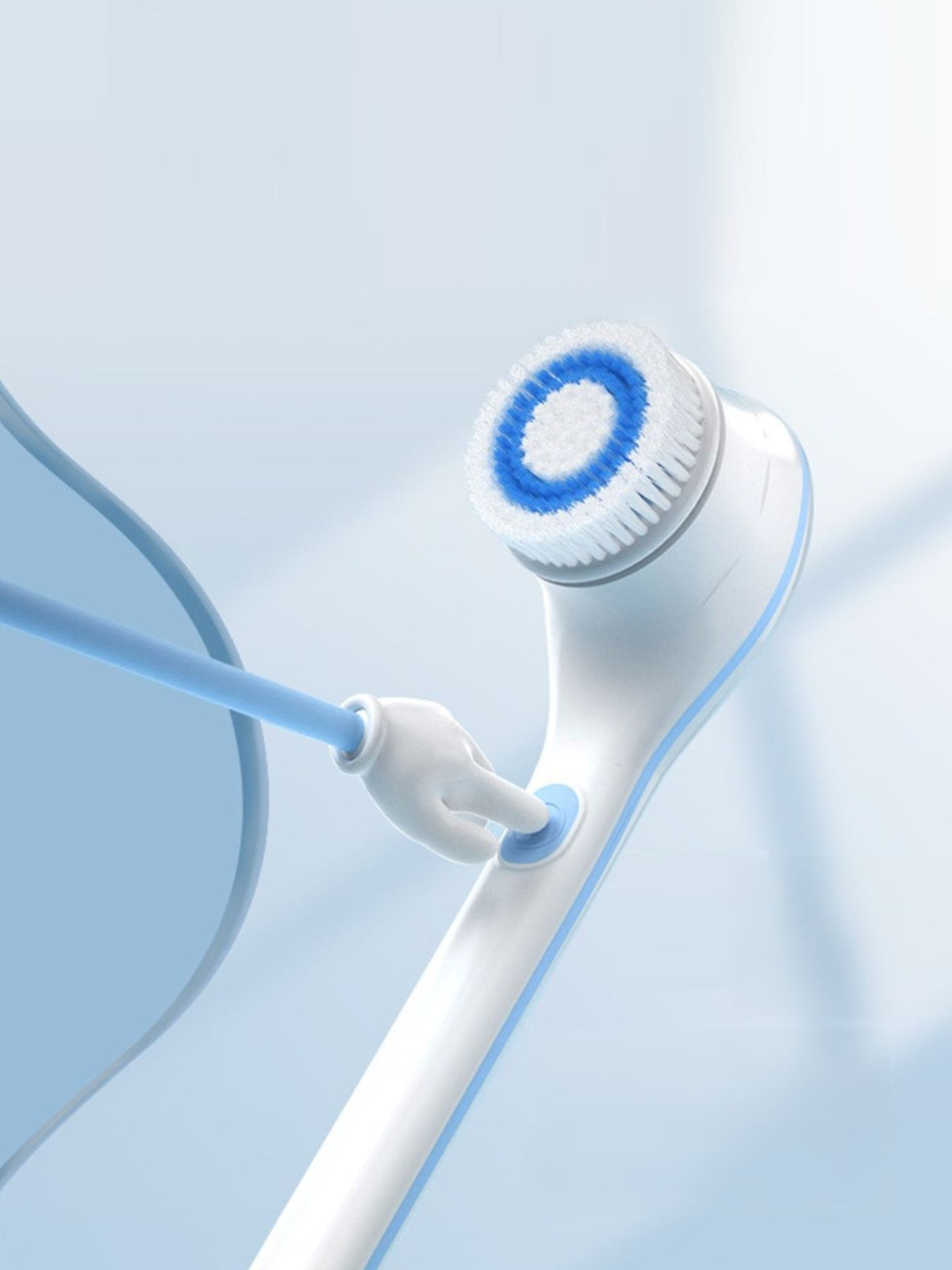 Facial cleansing brush in use on face