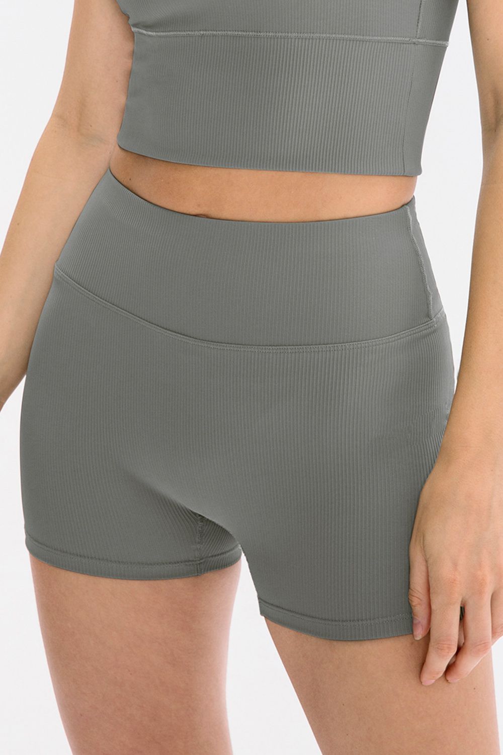 Slim fit wide waistband sports shorts styled outfit view