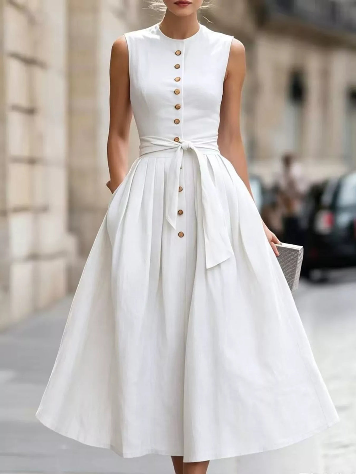 Close up of the belt tie at the waist of the dress
