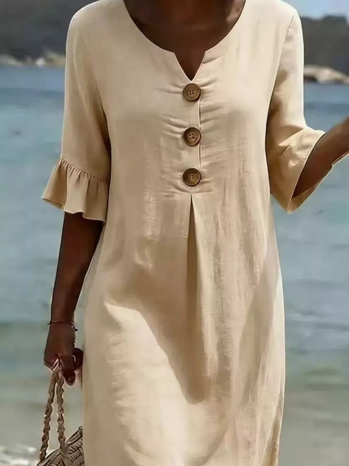 Ruffle sleeve dress in a sky blue shade