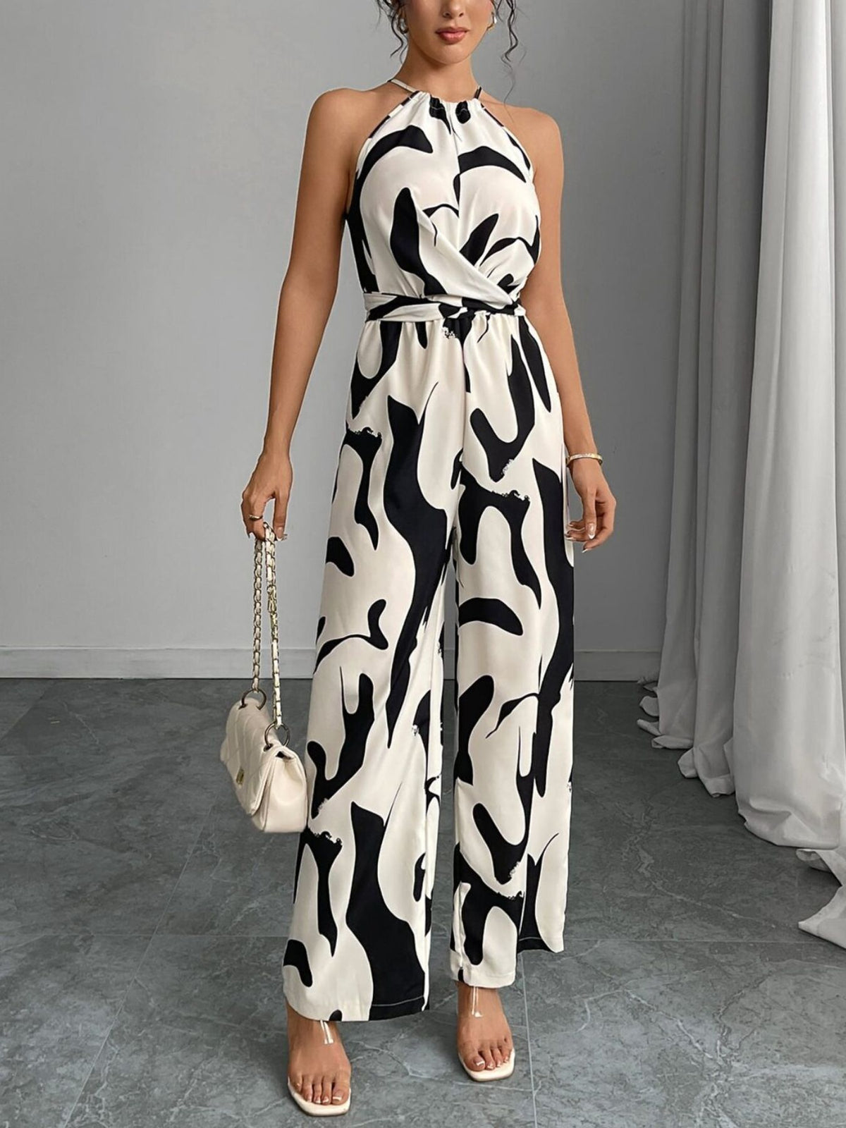 Black abstract print wide leg jumpsuit, front view