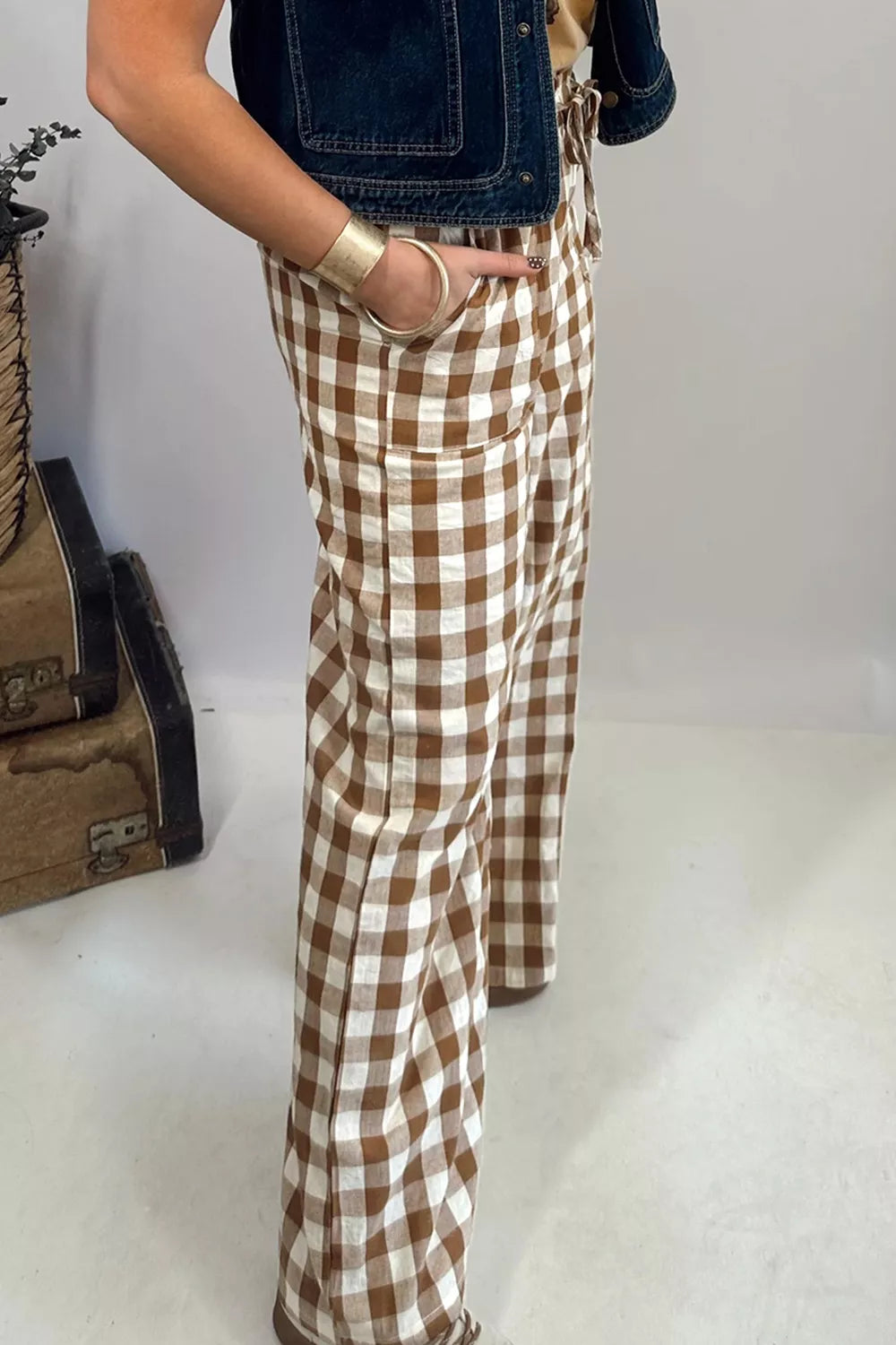 Back view of the taupe gingham plaid pants