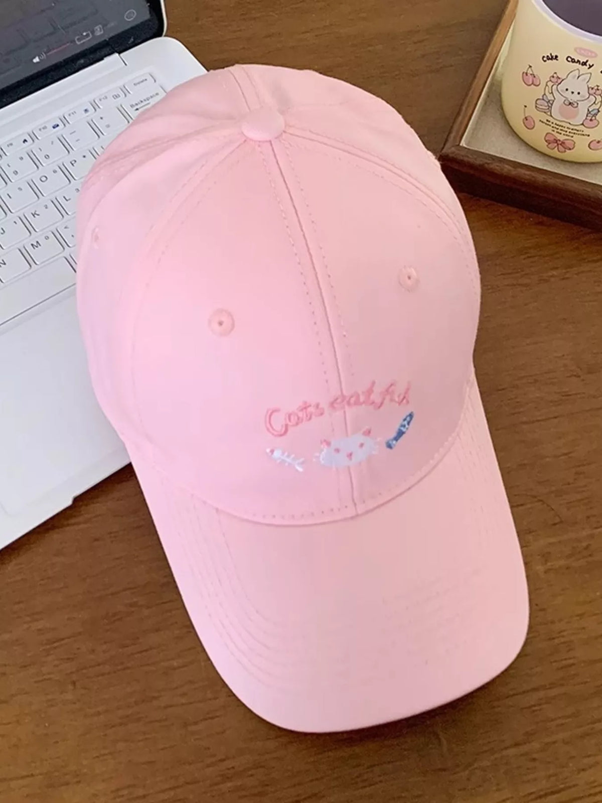 Side profile of the cotton cap showing the brim