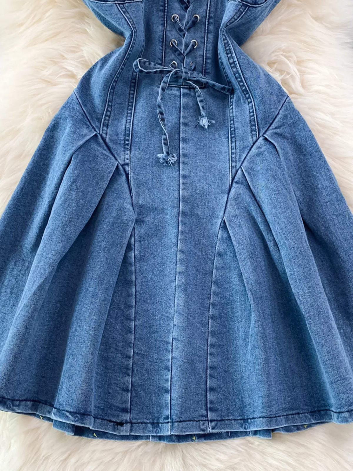 Blue lace up denim A line mini dress side view
