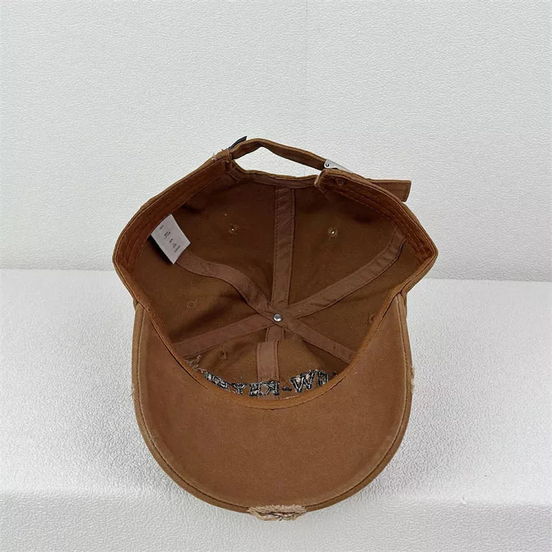 Back view of the cotton cap showing the closure strap