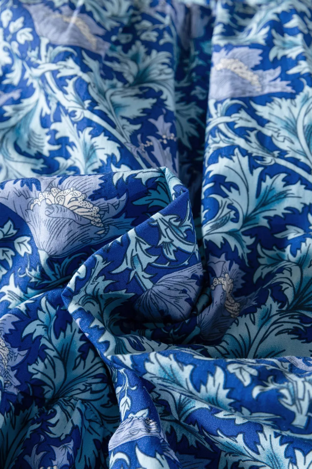 Dusty blue floral V neck tiered maxi dress styled view