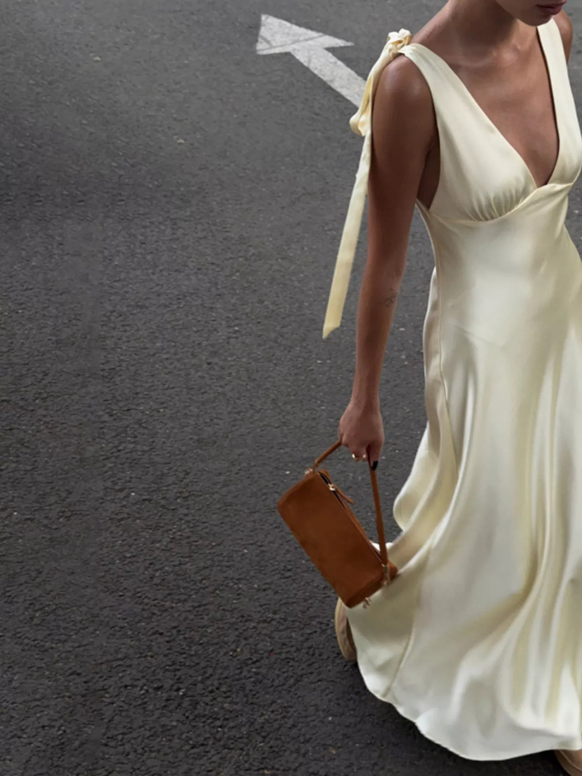 Full length view of the beige satin evening dress