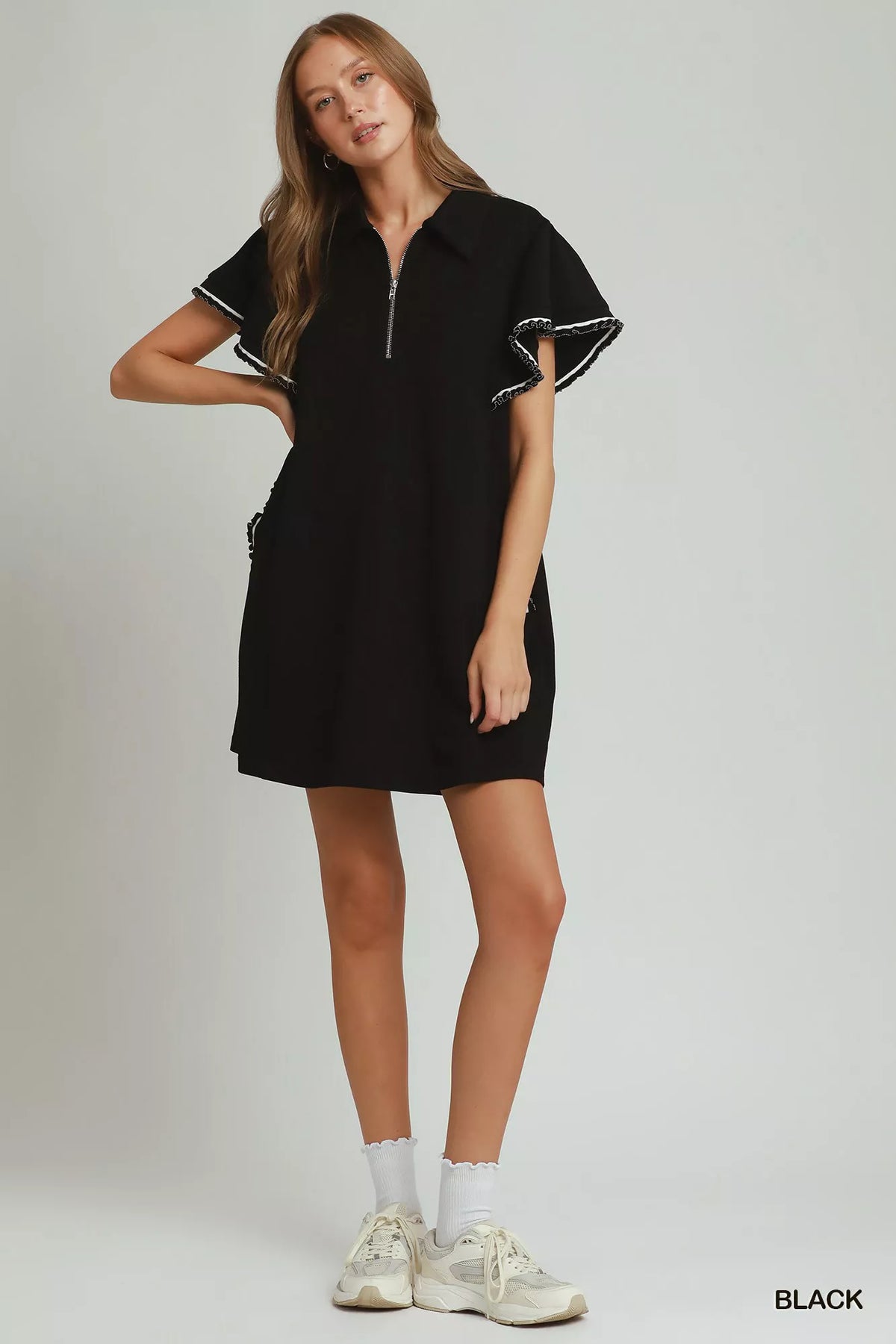 Black half zip butterfly sleeve knit mini dress detail view