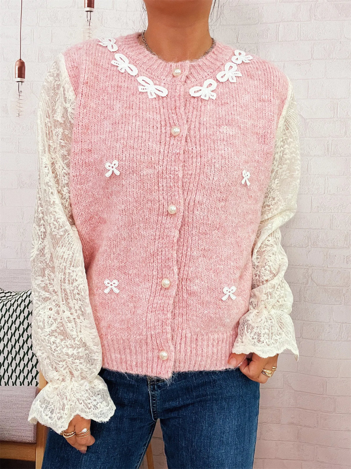 Lace sleeve button up cardigan worn on model