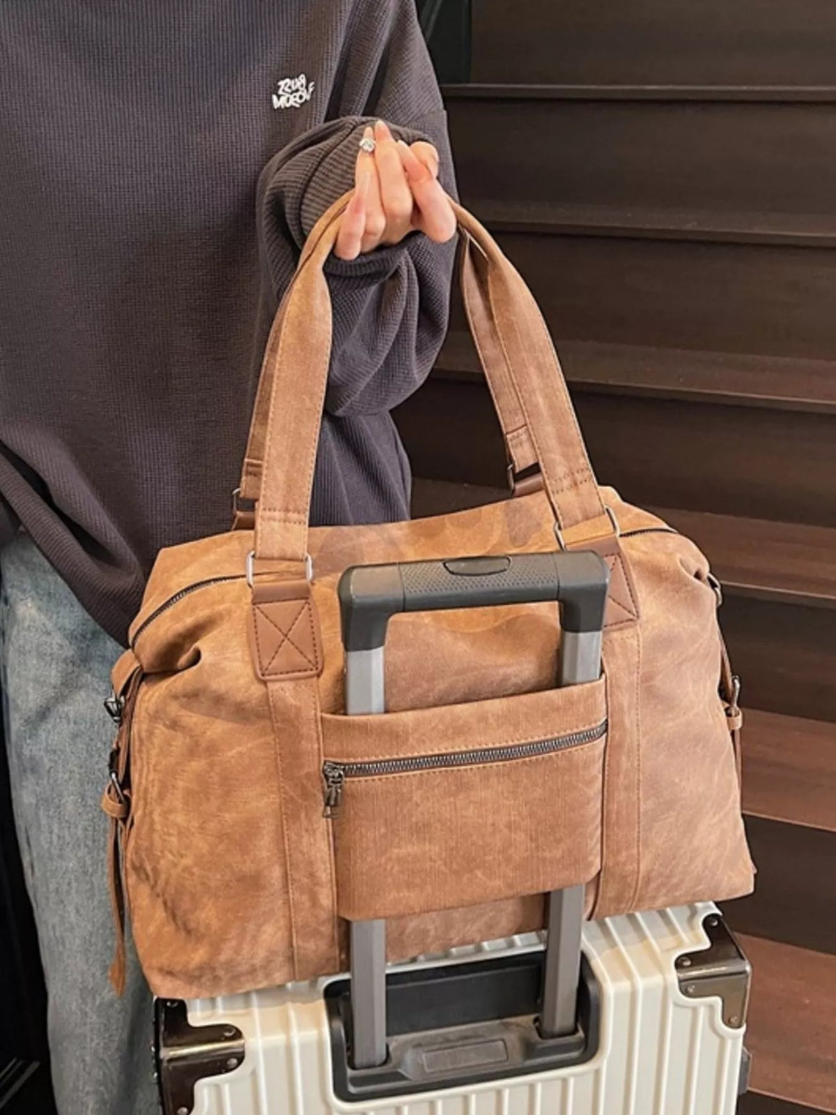 Vintage duffel bag adjustable strap detail