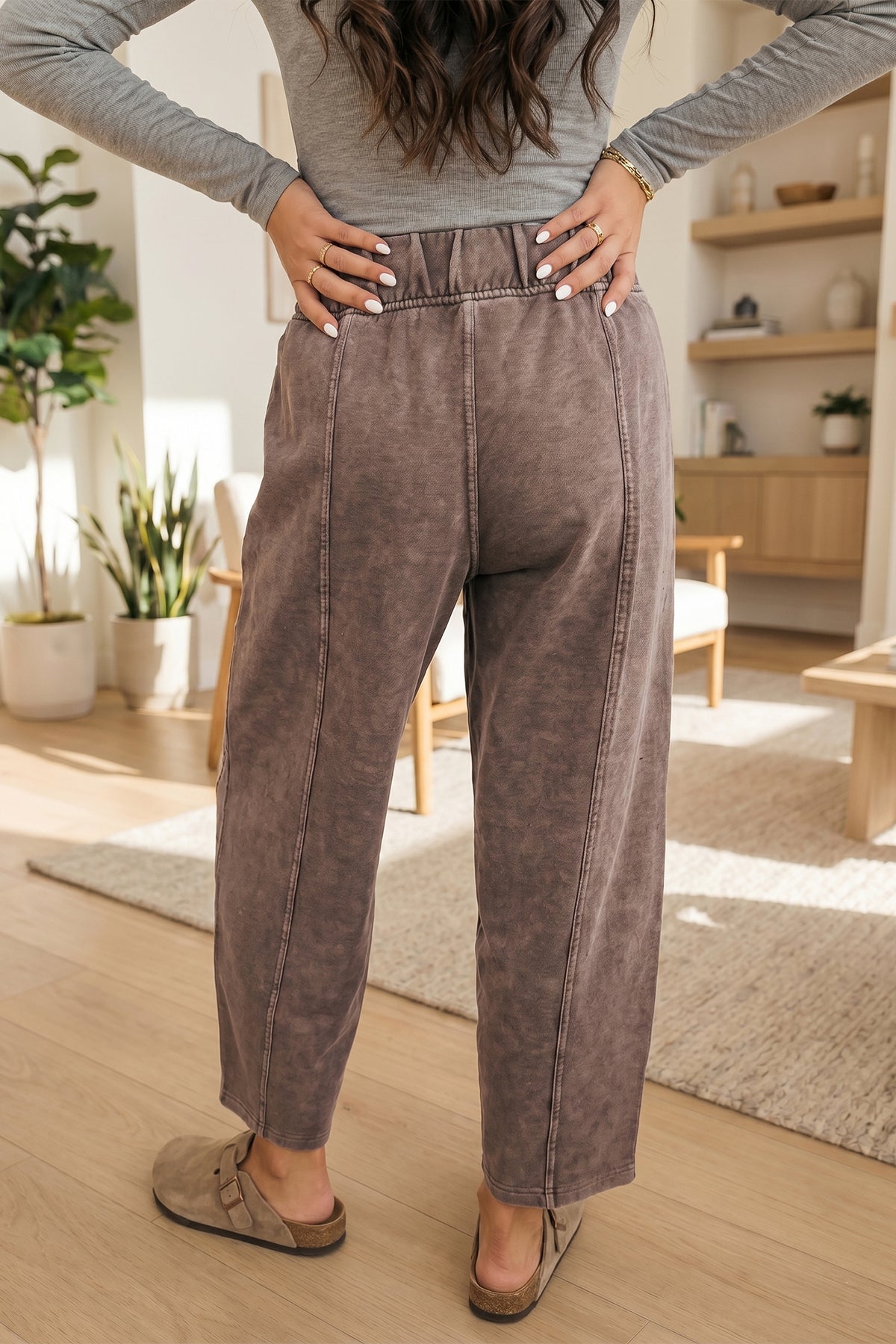 Brown barrel pants side view showing relaxed leg