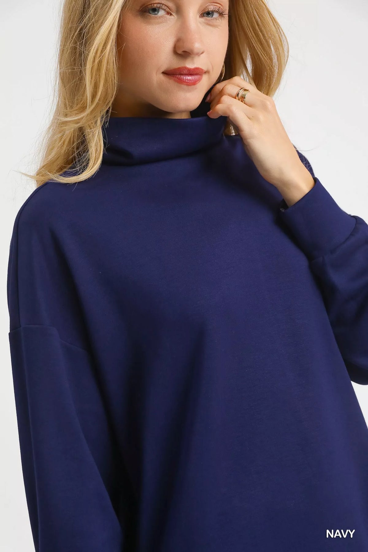 Turtleneck Dolman Sleeve Side Slit Sweater in Navy styled look